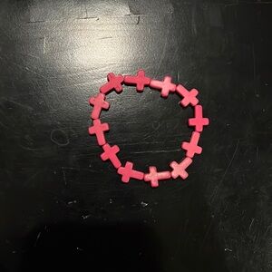 BKE-Elastic Pink Cross Bracelet